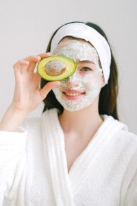 cheerful woman with mask and avocado stockpack pexels 200x300 - 13 Homemade Face Masks For Glowing Youthful Skin