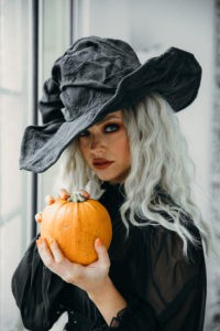 woman in halloween costume holding a pumpkin stockpack pexels 200x300 - 25 Homemade Halloween Costumes Ideas
